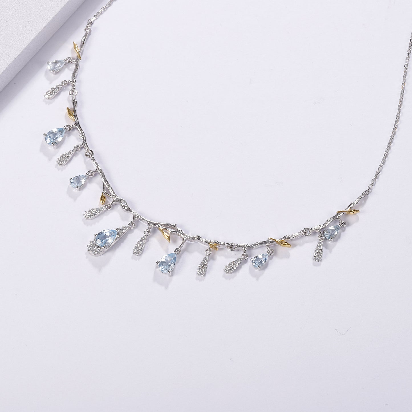 OliyaDesign Designer-Designed Necklace Featuring Exquisite Gemstone Floral Patterns In S925 Sterling Silver With Natural Topaz.