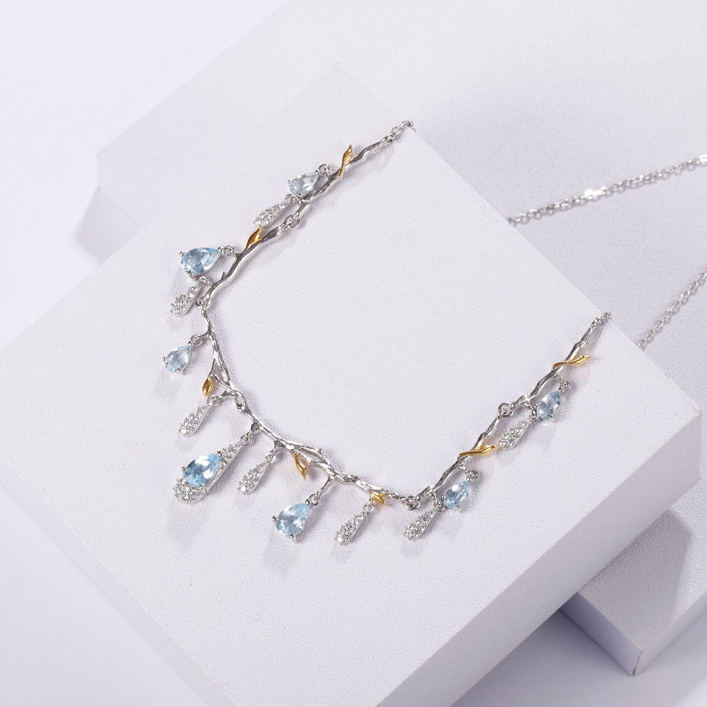 OliyaDesign Designer-Designed Necklace Featuring Exquisite Gemstone Floral Patterns In S925 Sterling Silver With Natural Topaz.